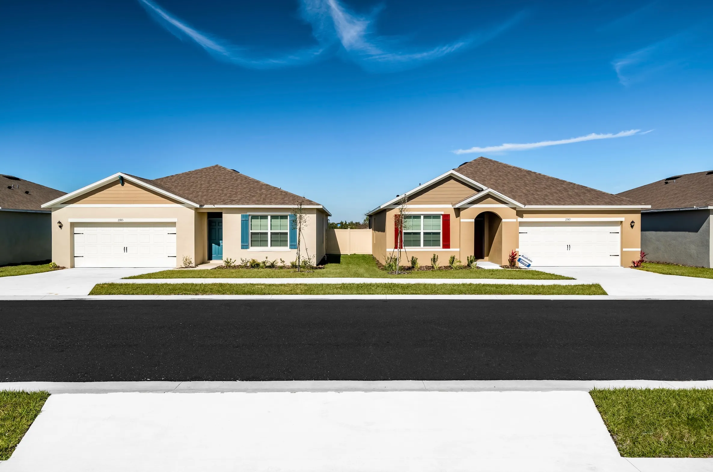 Charming single-story homes with private driveways and manicured lawns.