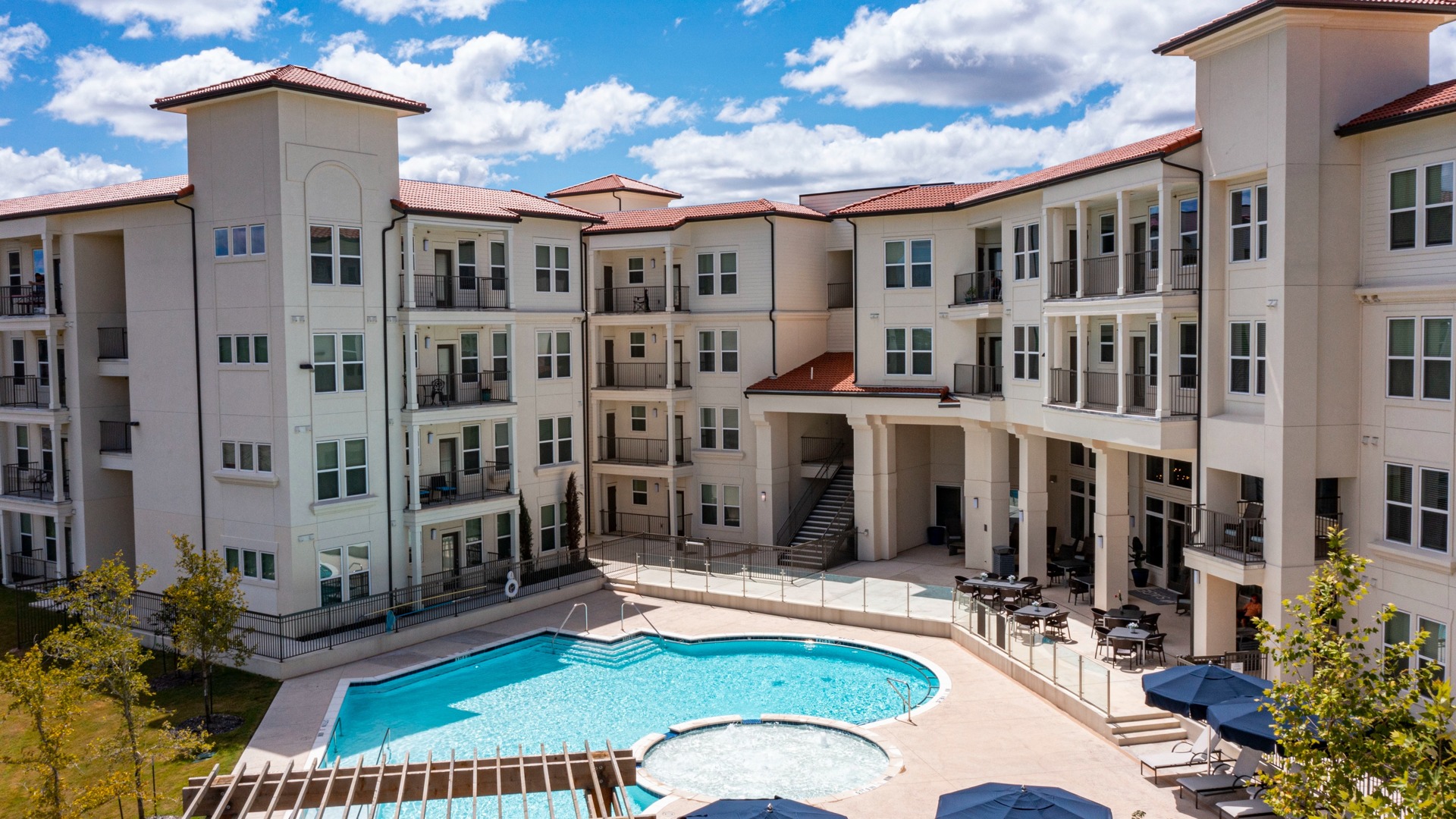 Exterior Drone image of pool side