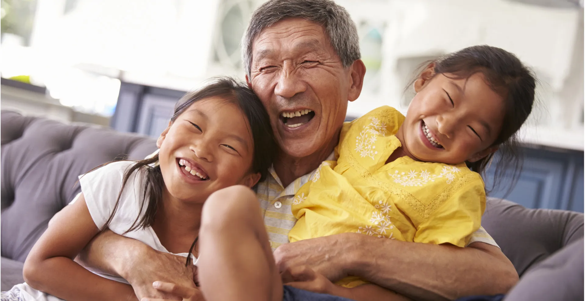 Man with two small children