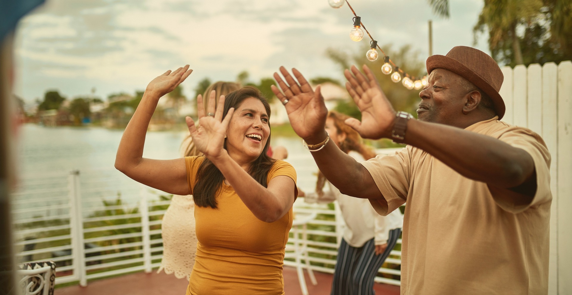 Man and Woman Dancing on Patio