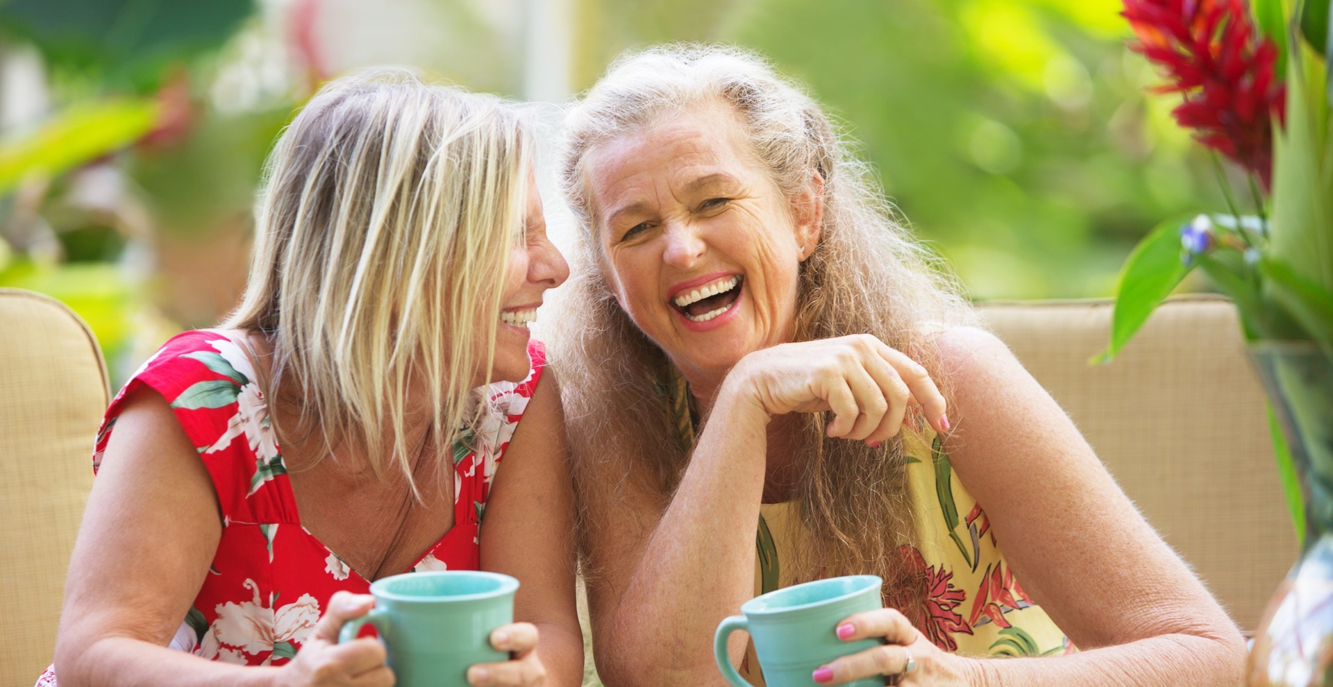 Friends Laughing While Drinking Coffee