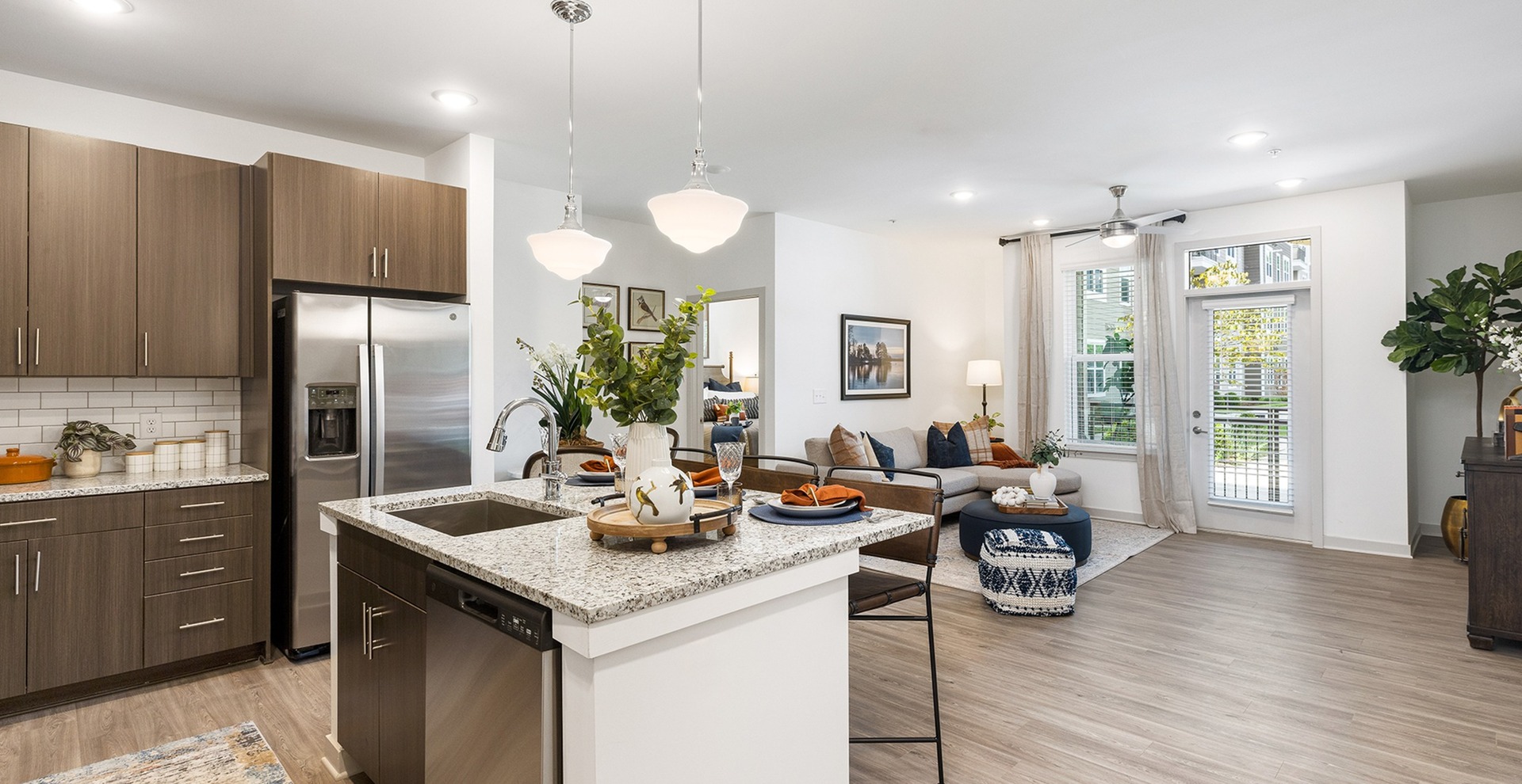 Modern Kitchen and Spacious Living Room at Our 55+ Living Community in Huntersville