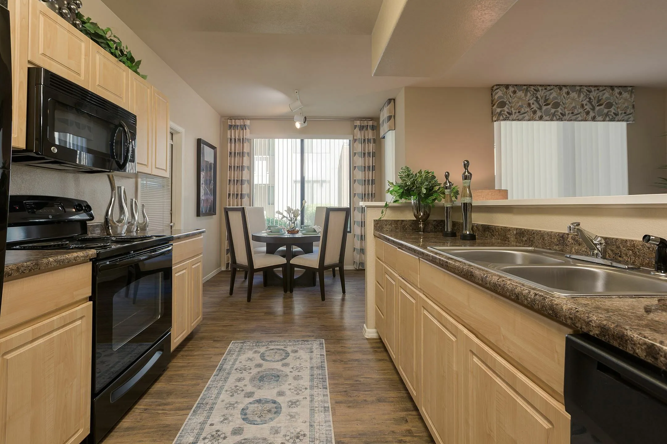 Apartment kitchen — representative home at Aria on Cave Creek Apartments.