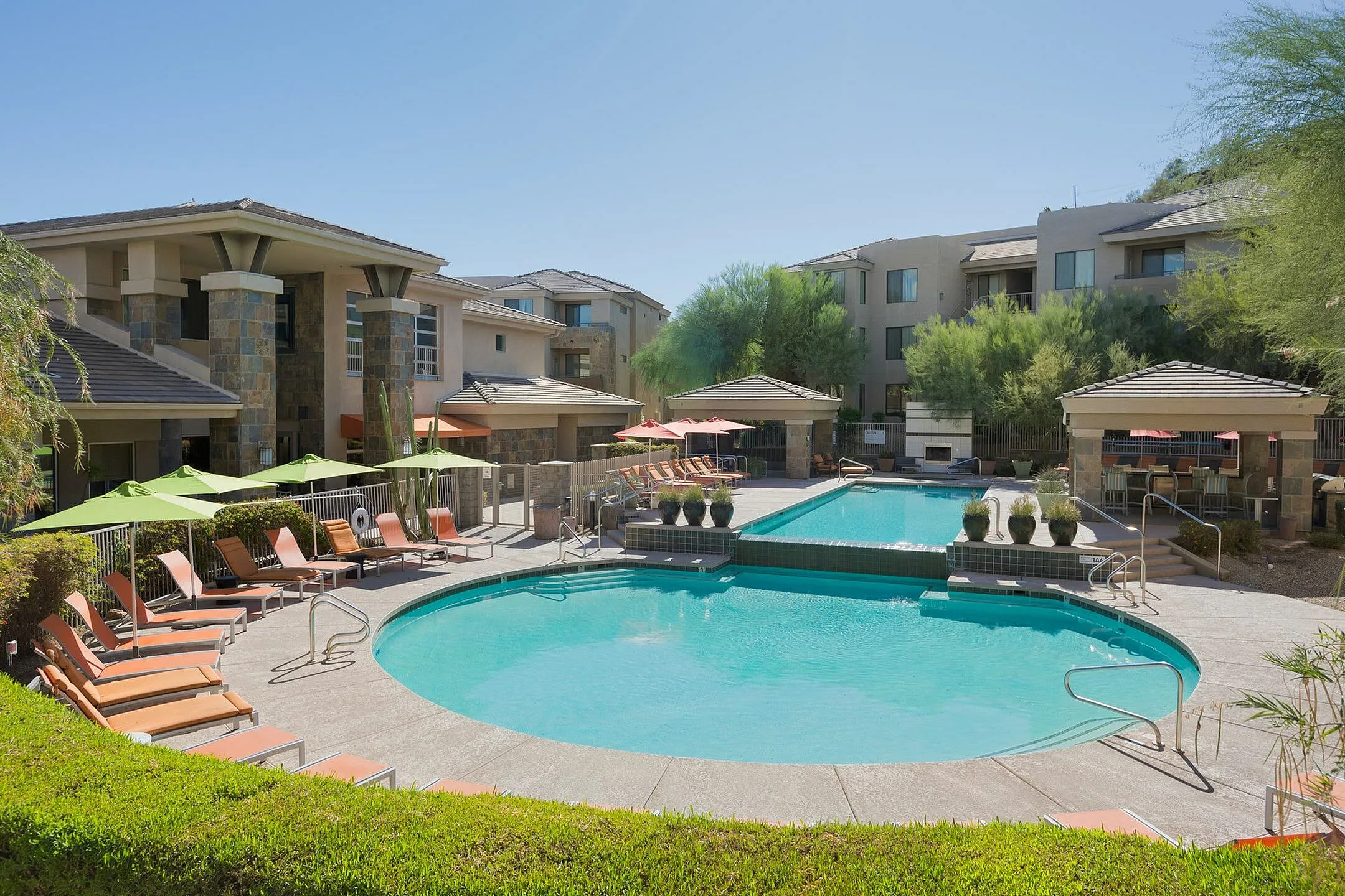Pool and poolside area at Aria on Cave Creek Apartments.