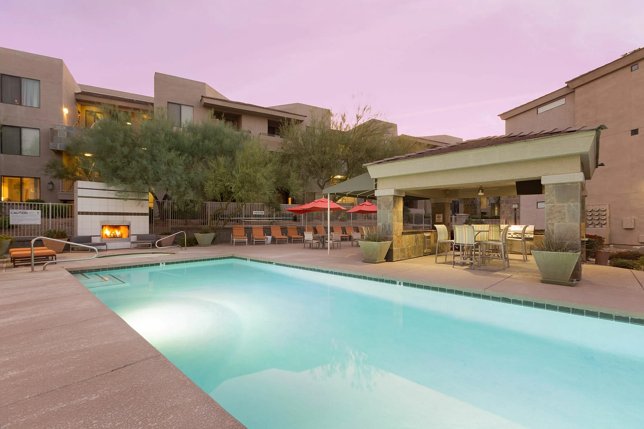 Pool and poolside area at Aria on Cave Creek Apartments.