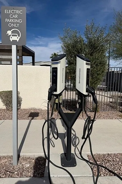 Modern electric car charging stations throughout the community.