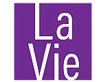 Elegant purple and white logo for La Vie, showcasing modern simplicity and brand sophistication.