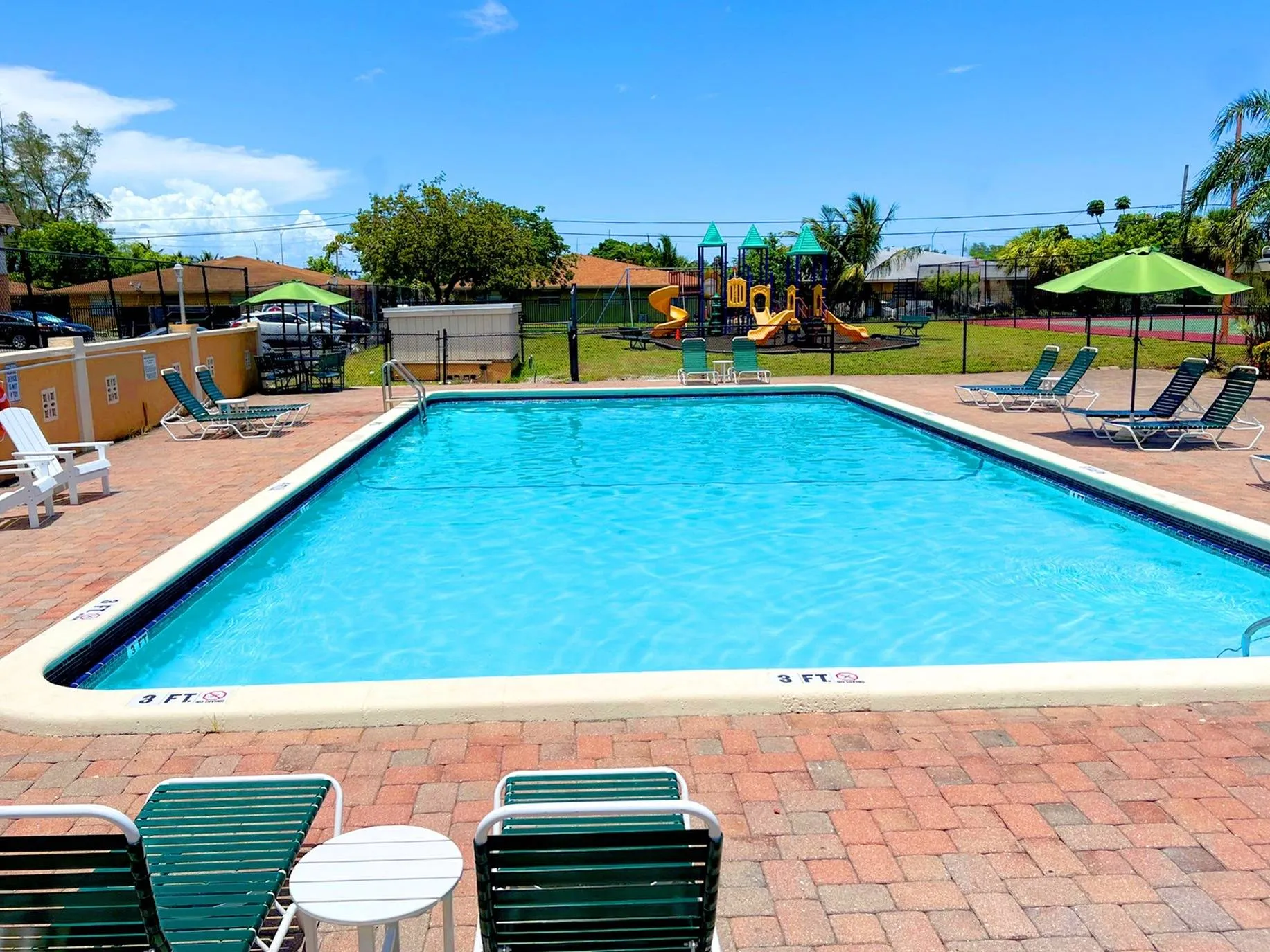 Refreshing Swimming Pool with Sundeck and Outdoor Showers