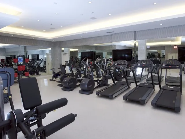 24-Hour Fitness Center and Weight Room with Private Lockers and Boxing Feature