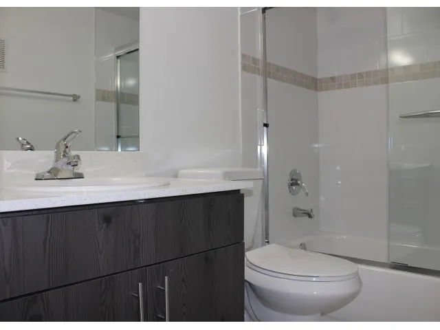 Image of Bathtub and Shower with Sliding Glass Enclosure.* for Pompano Palms Apartments