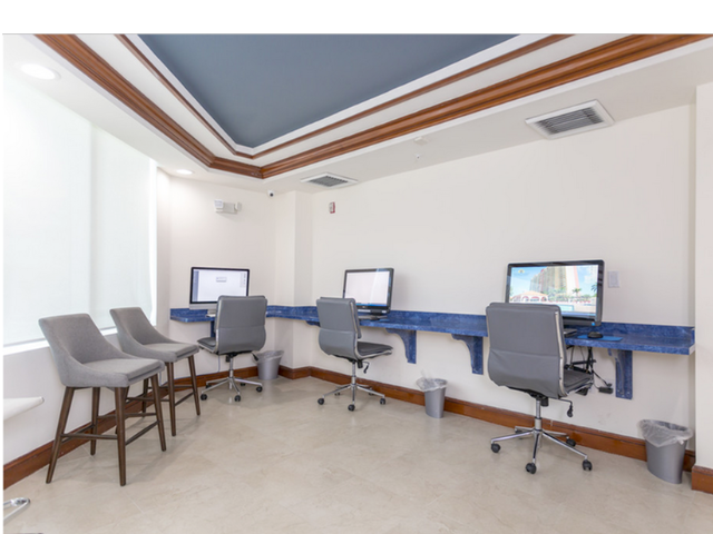 Fully Equipped Business Center with Laptop Lounge
