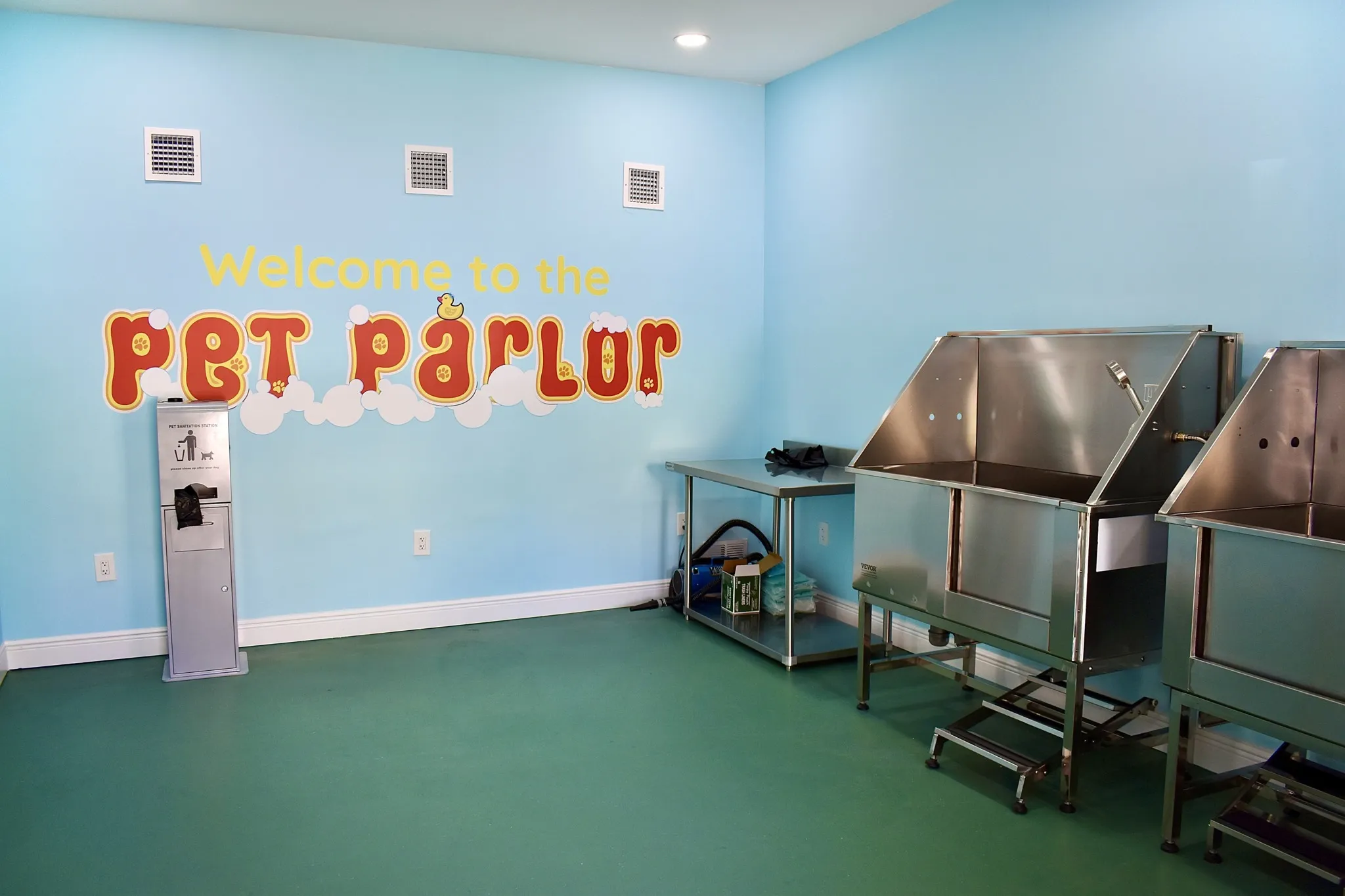 Pet Spa with Washing Stations, Dryers, and Grooming Area