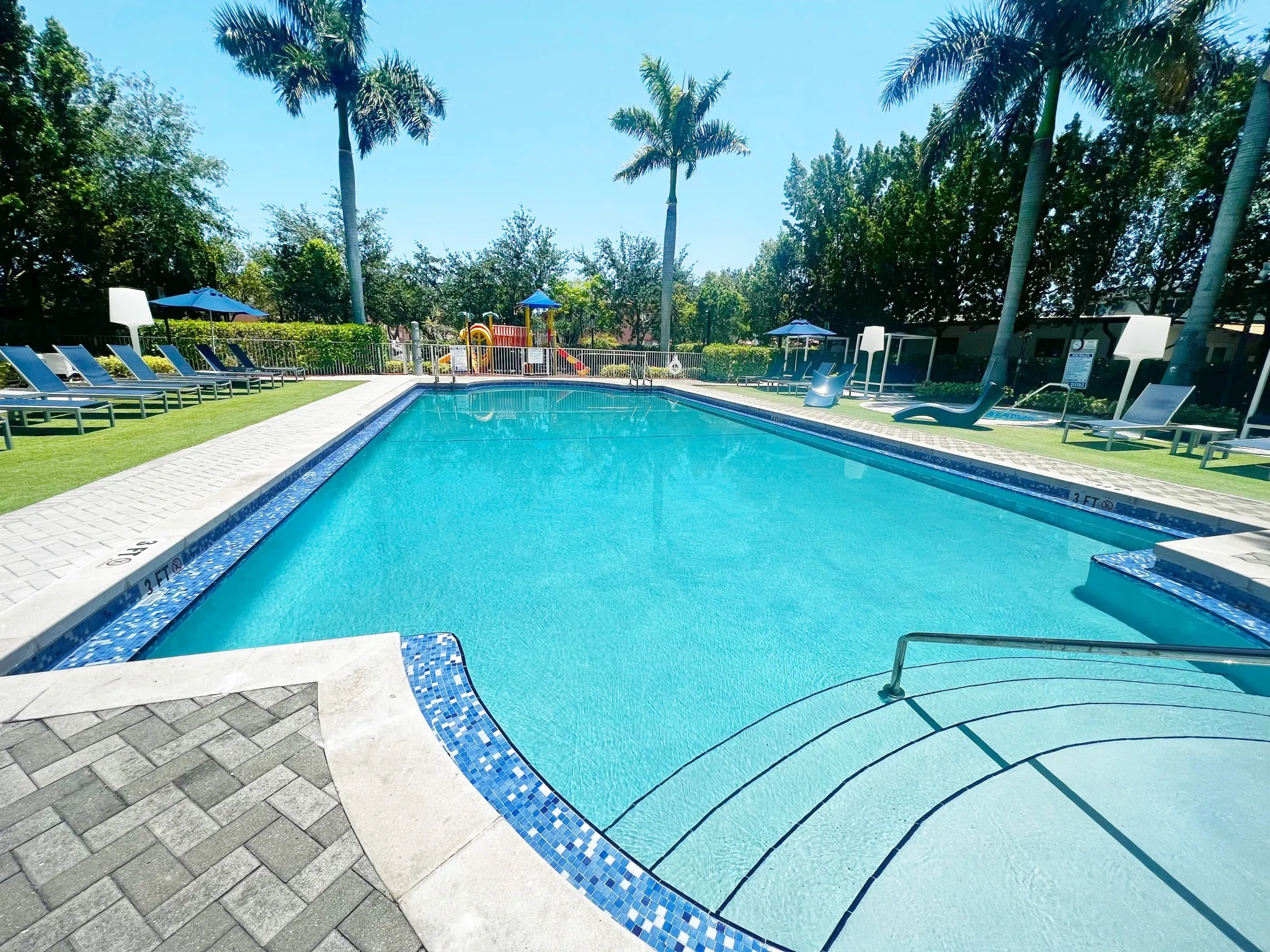 Oversized Pool with Extensive, Mature Landscaping, Sundeck, Hot Tub & Water Features