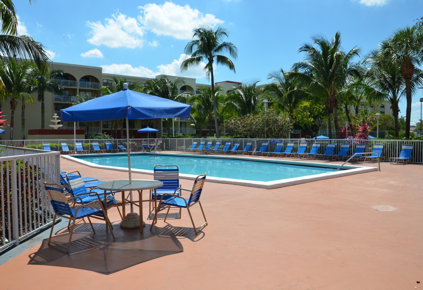 pool area with tables and chairs