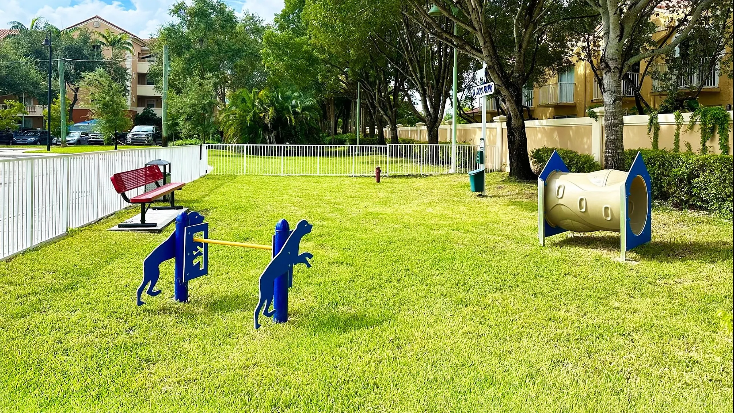 sunrise village, dog park with training stuff