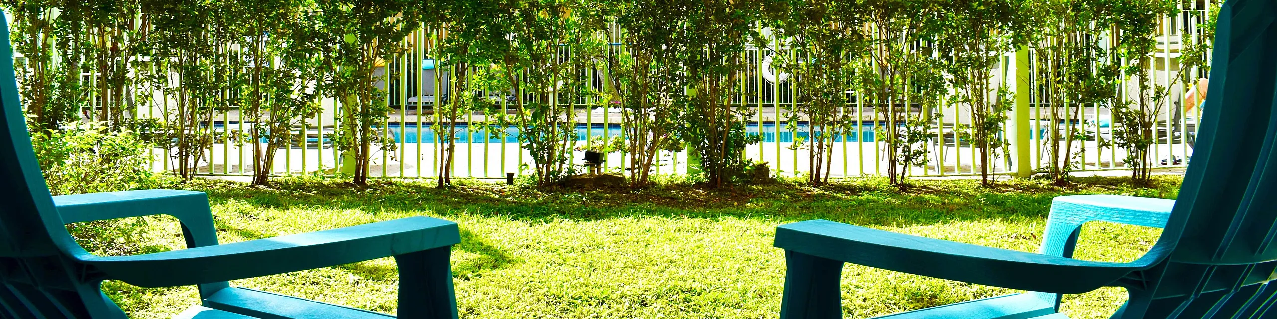 sunrise village, ground floor unit terrace view to pool deck