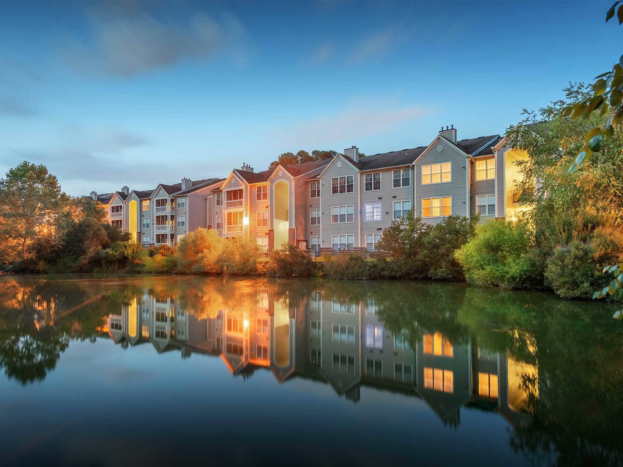 Evening apartment community view from the lake