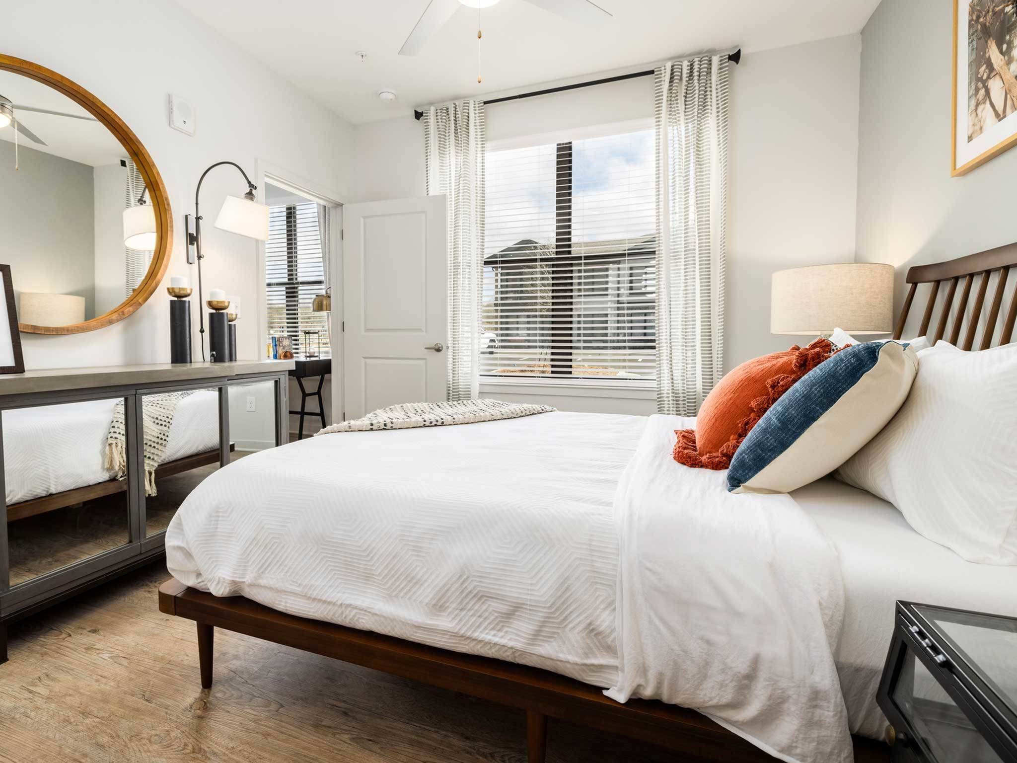 Bright bedroom, ceiling fan and light