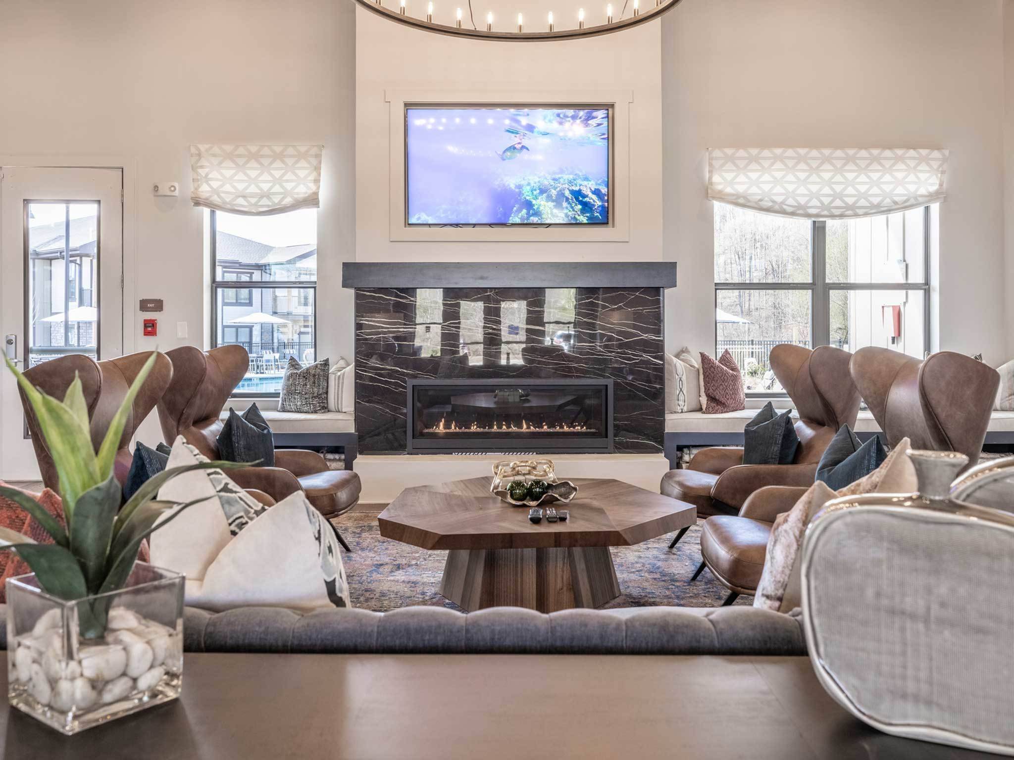 Interior clubhouse, comfortable seating around a fireplace