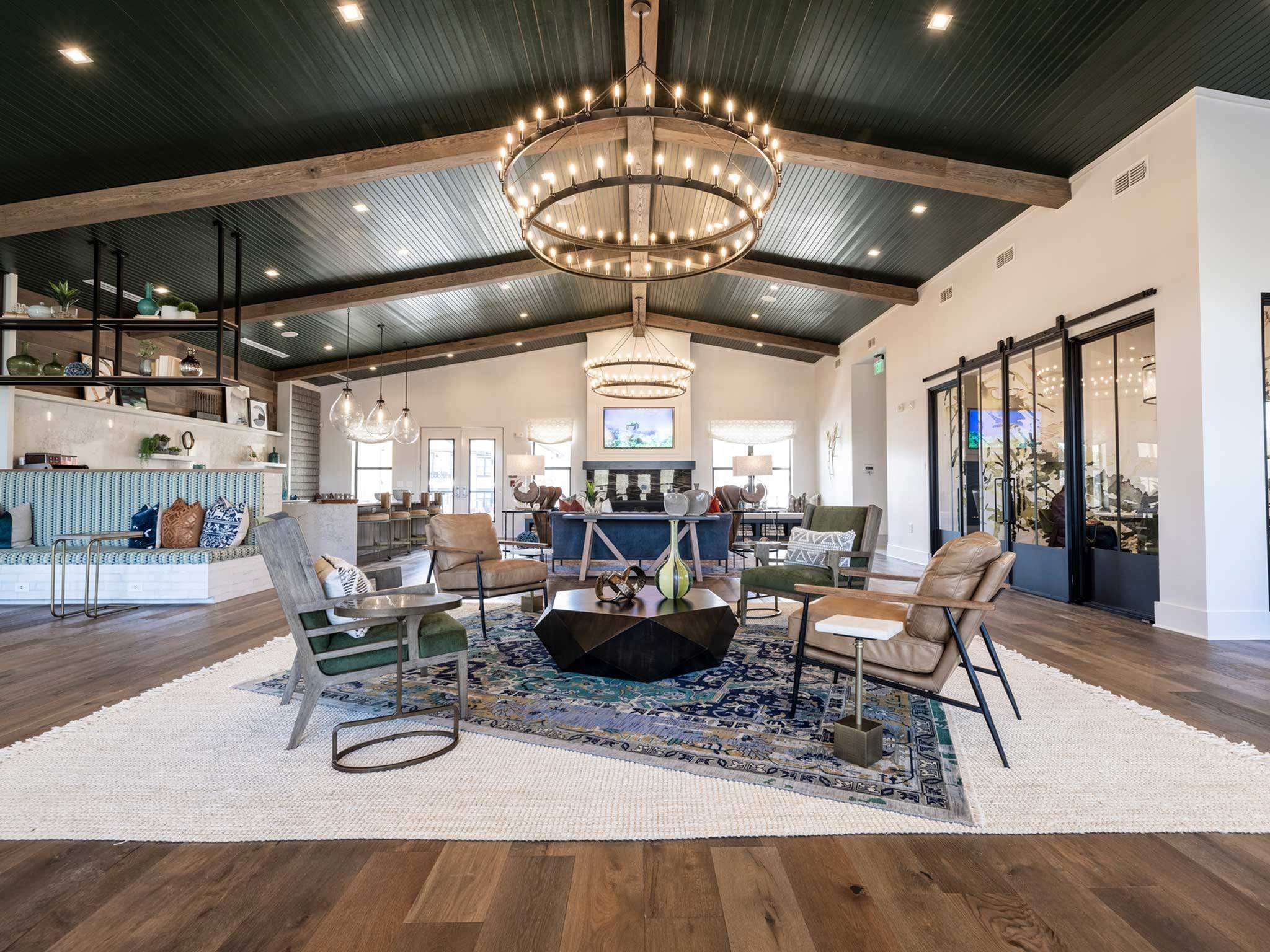 Interior of clubhouse, with seating around, modern barn-style