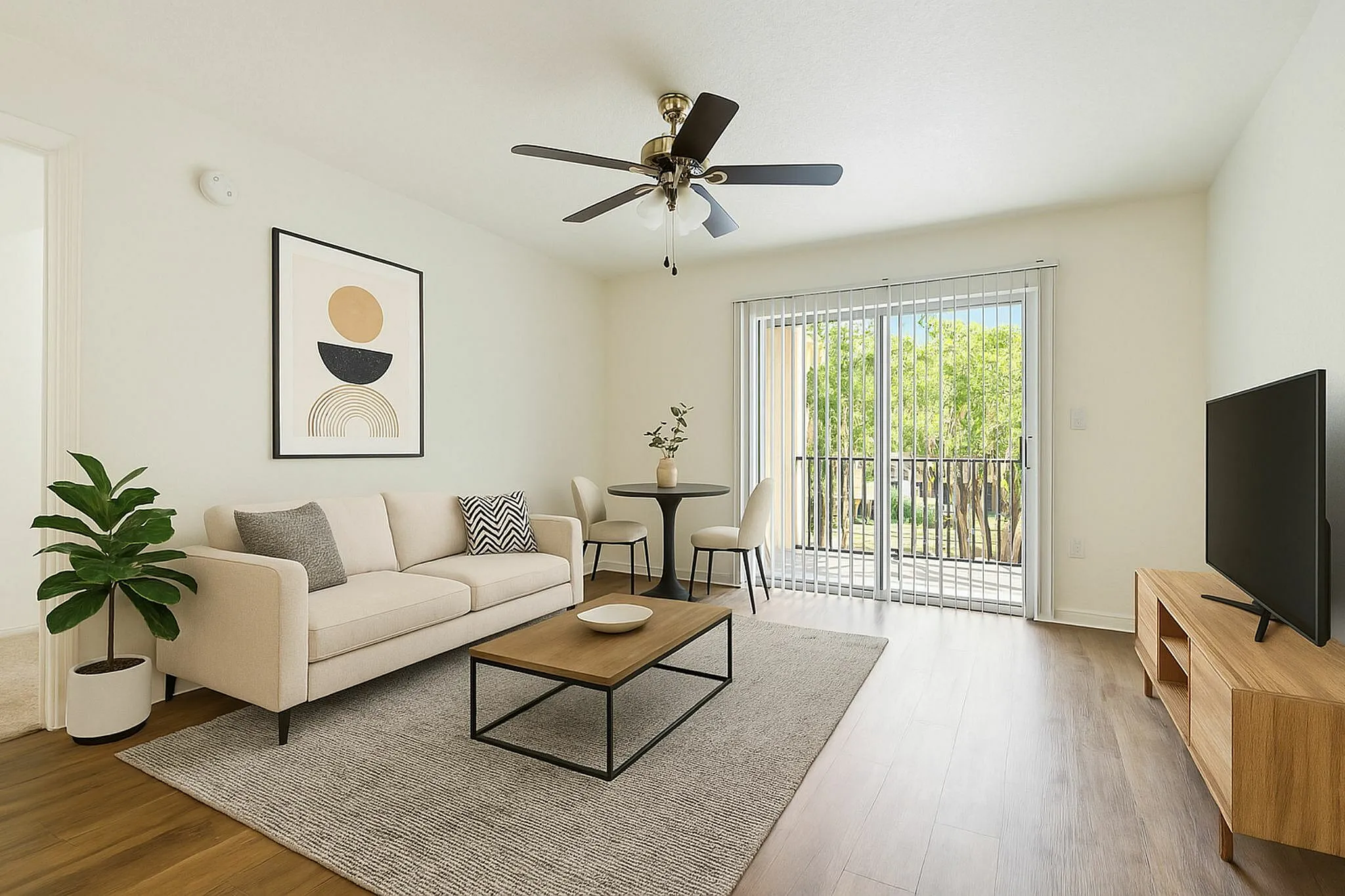 Bright and modern living room with a cozy beige sofa, elegant wall art, and a large window offering a serene garden view, perfect for relaxation and entertaining.