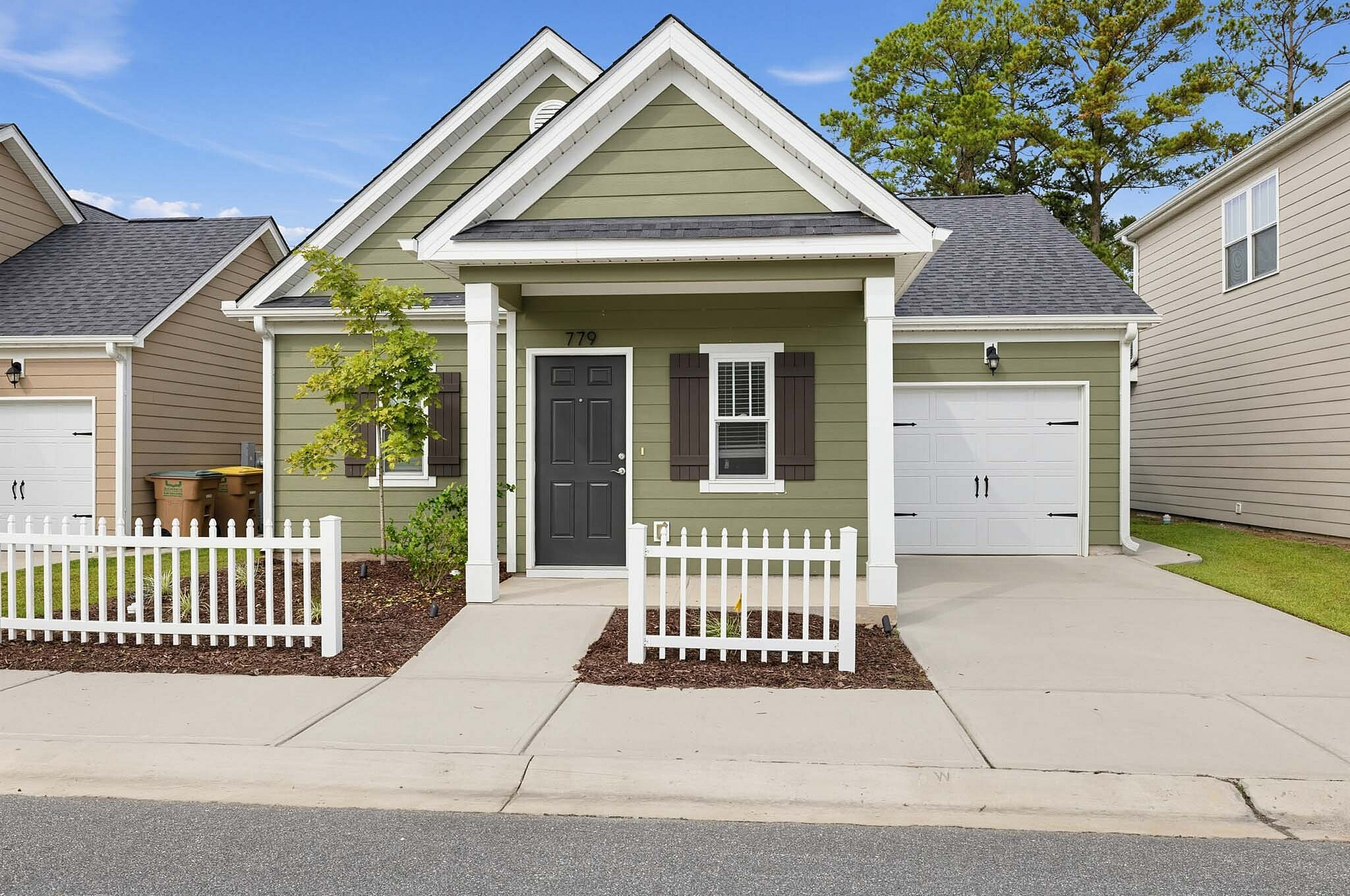 LEO at the Sanctuary- Single Family Rental Homes - Green Exterior