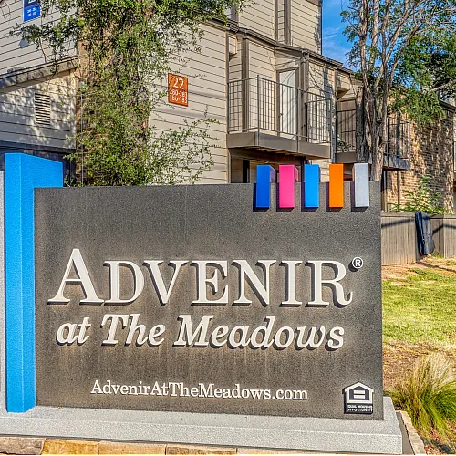 Welcome to Advenir at The Meadows, showcasing modern apartments nestled in a serene, leafy environment.