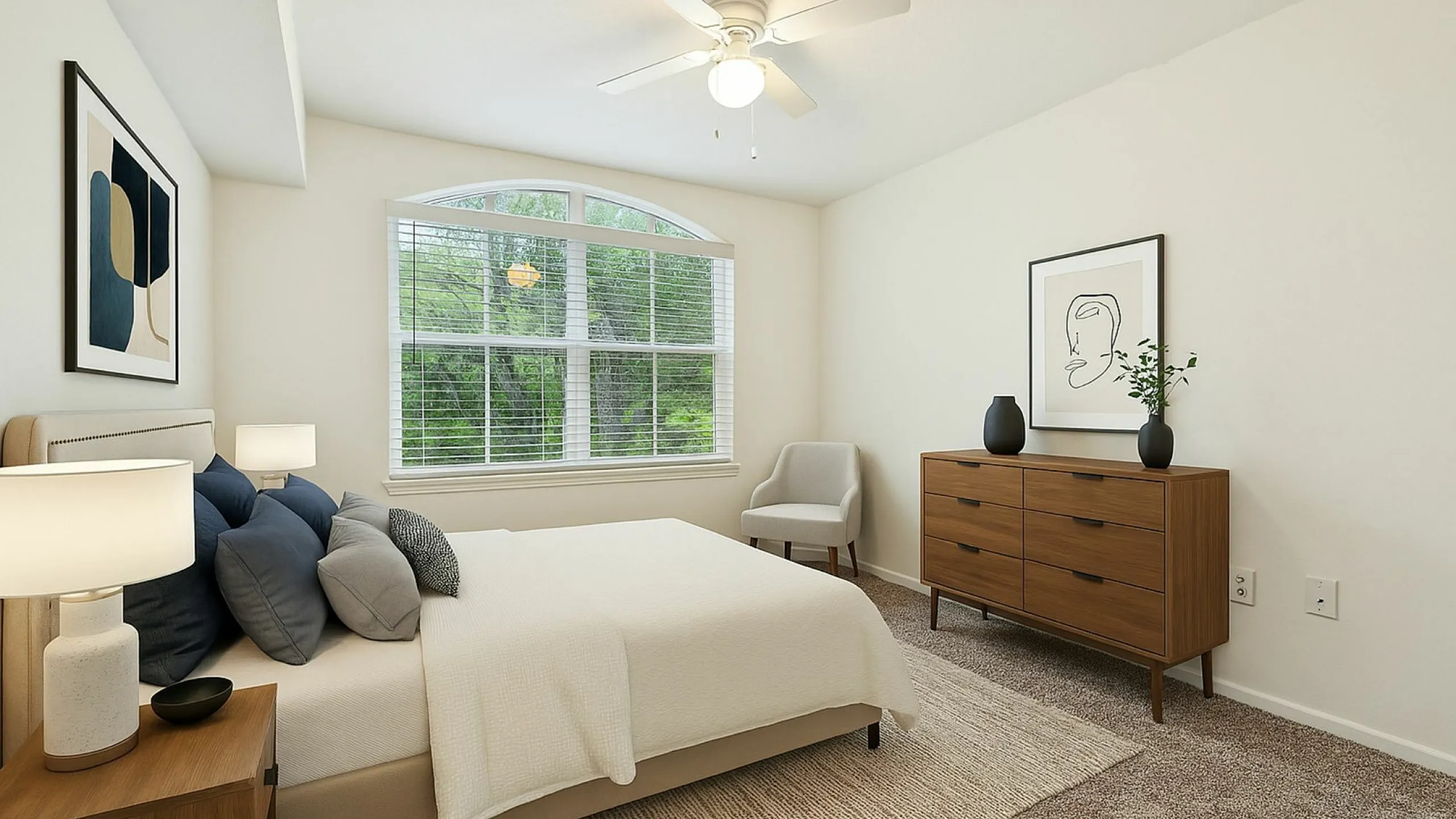 Inviting bedroom with large window, stylish decor, and modern furniture, creating a serene atmosphere.