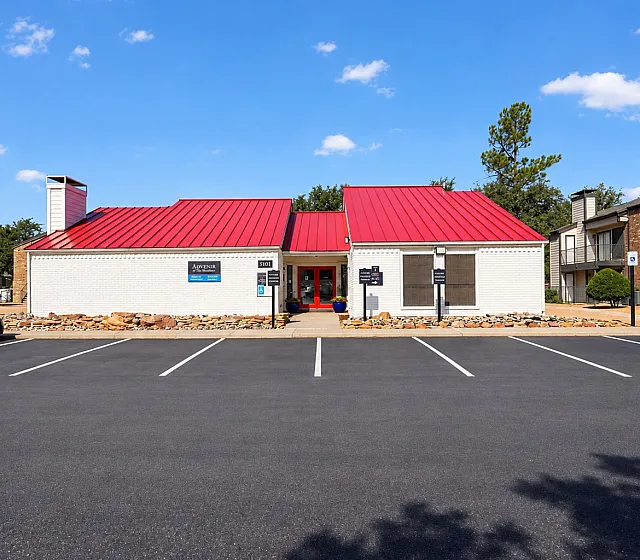 Advenir at The Meadows - Red Roof Building