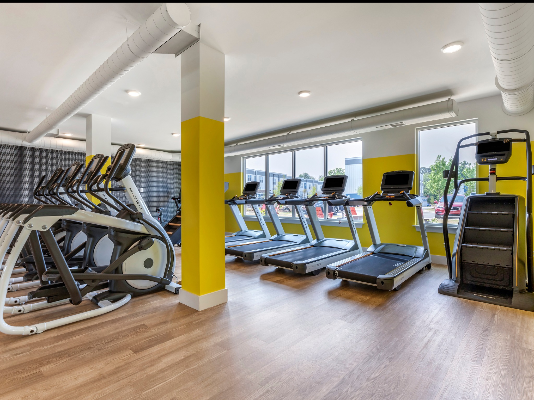 Cardio Equipment in Resident Fitness Center | Paloma Raleigh | New Apartments Near NCSU in Raleigh