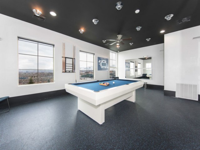Image of Club lounge with refreshment bar, TV wall, pool and ping pong tables for The Republic