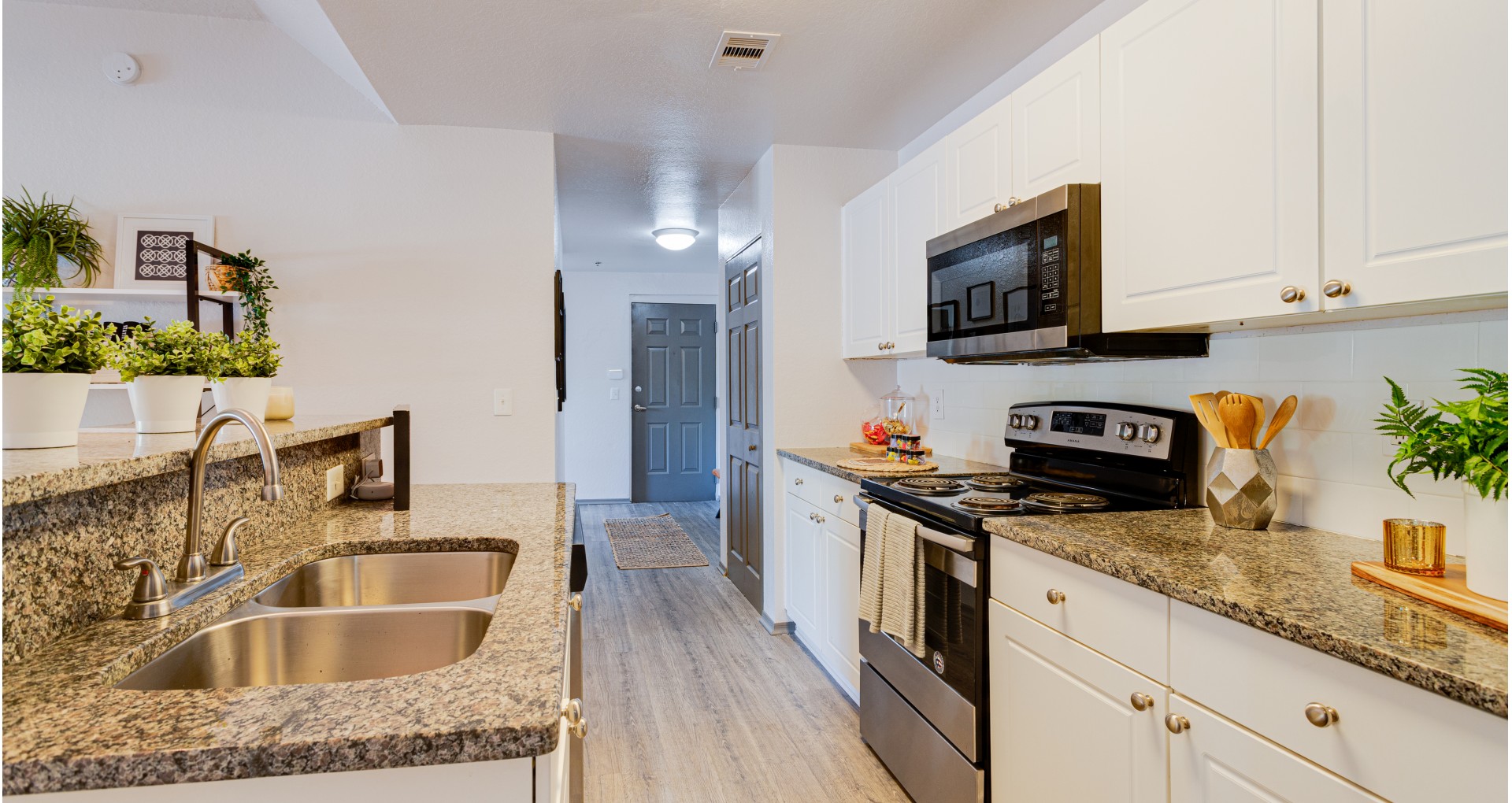 Kitchen & Laundry | Station 42 | Tampa Apartments Near USF