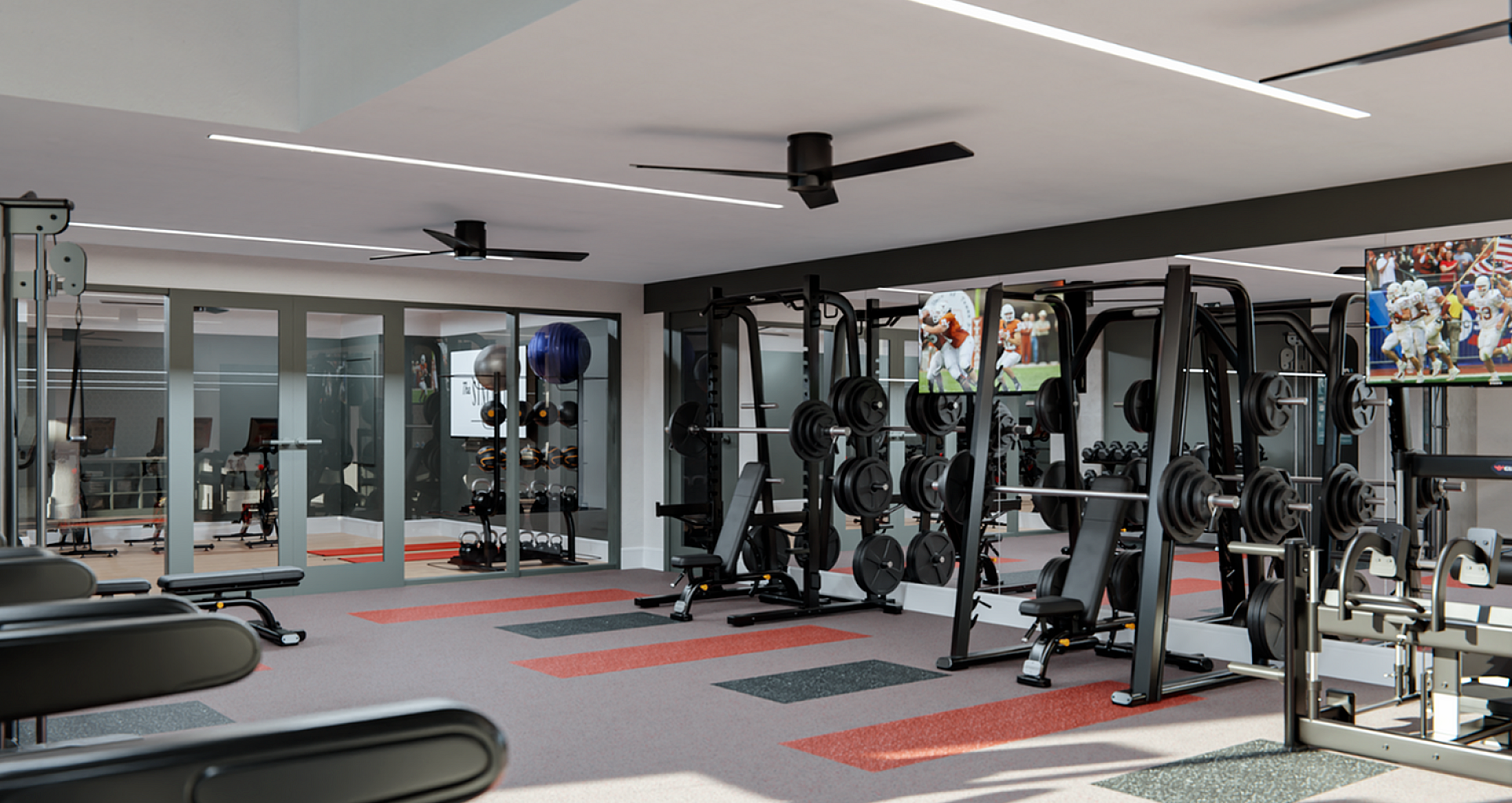 Modern fitness center with state-of-the-art equipment, large mirrors, and vibrant flooring, perfect for an active lifestyle.