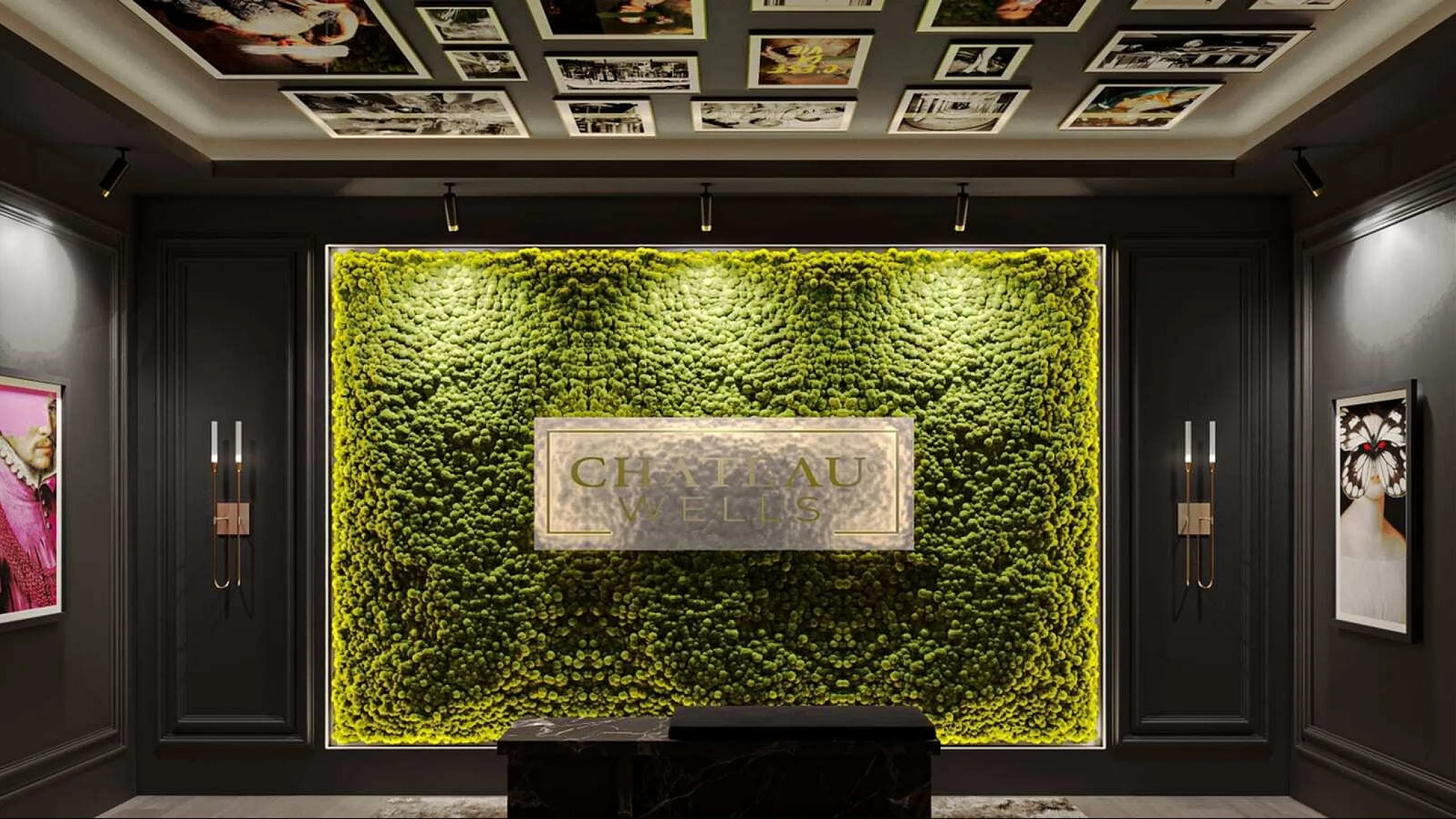 Luxurious and modern lobby with a vibrant green moss wall, artistic ceiling, and elegant framed artworks on dark walls.
