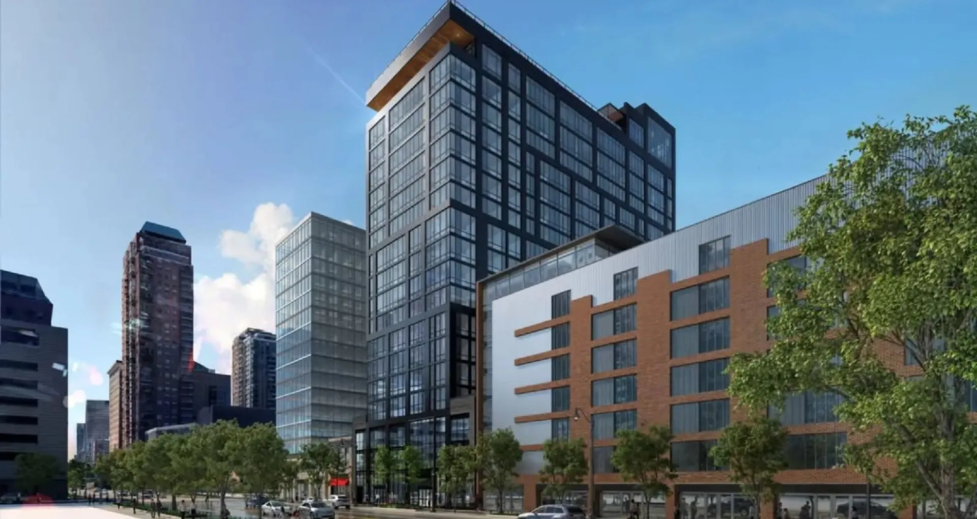 Modern high-rise apartment building with sleek glass fa&ccedil;ade and vibrant cityscape backdrop, offering luxury urban living.