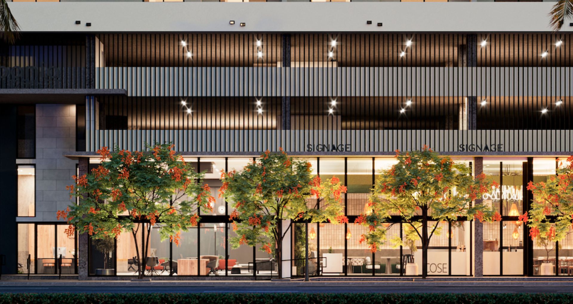 Contemporary building facade with warm lighting, vibrant greenery, and modern architecture.