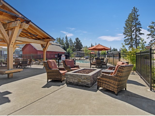Image of Outdoor Lounge with Fireplace for Seasons Apartments at Farmington Reserve