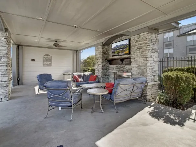 Image of Fireplace and Social Area Poolside for Stoneridge Farms at the Hunt Club Apartments