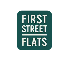 Modern and inviting logo of First Street Flats, featuring bold typography on a deep teal background.