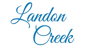 Elegant Landon Creek logo in flowing blue script with shadow effect.