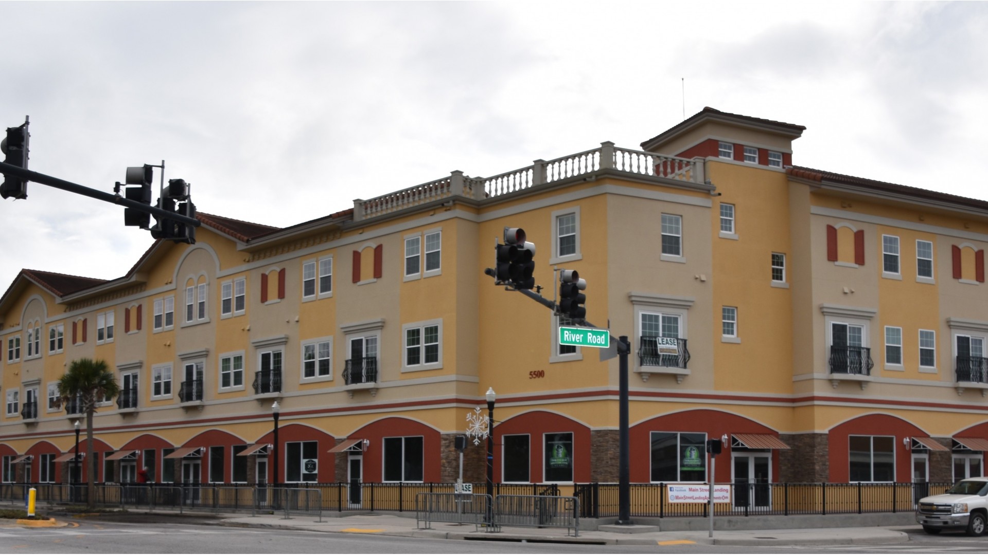 Front view of community with retail shops