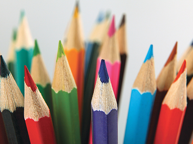 Vibrant array of colorful pencils with sharp tips ready for artistic creativity.