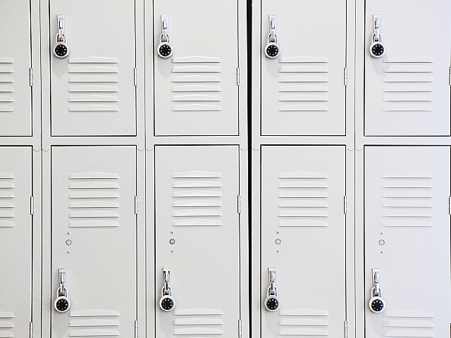 Sleek and modern storage lockers featuring secure combination locks, ideal for school or business environments.