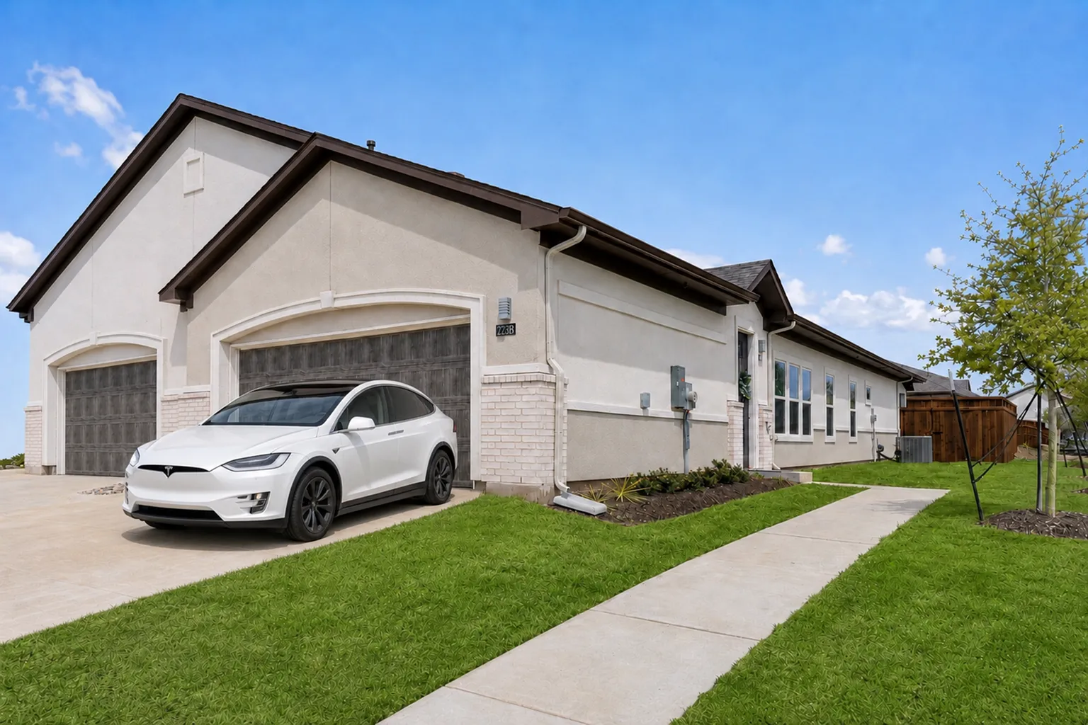 Exterior of modern rental home in Denton TX with attached garage near Denton Square