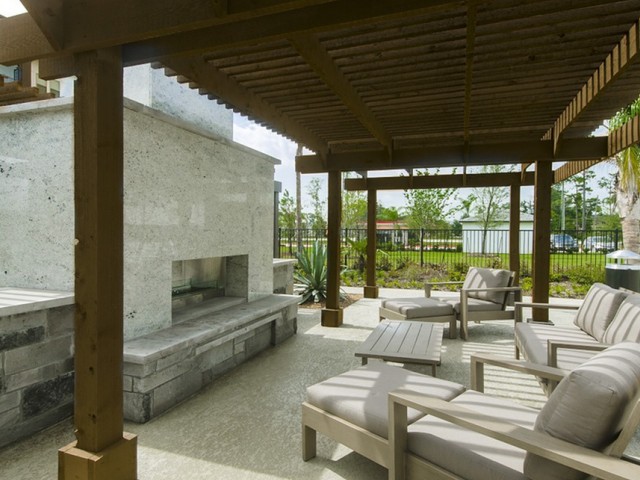 Trellis-Covered Outdoor Entertainment Kitchen & Conversational Fireplace Lounge