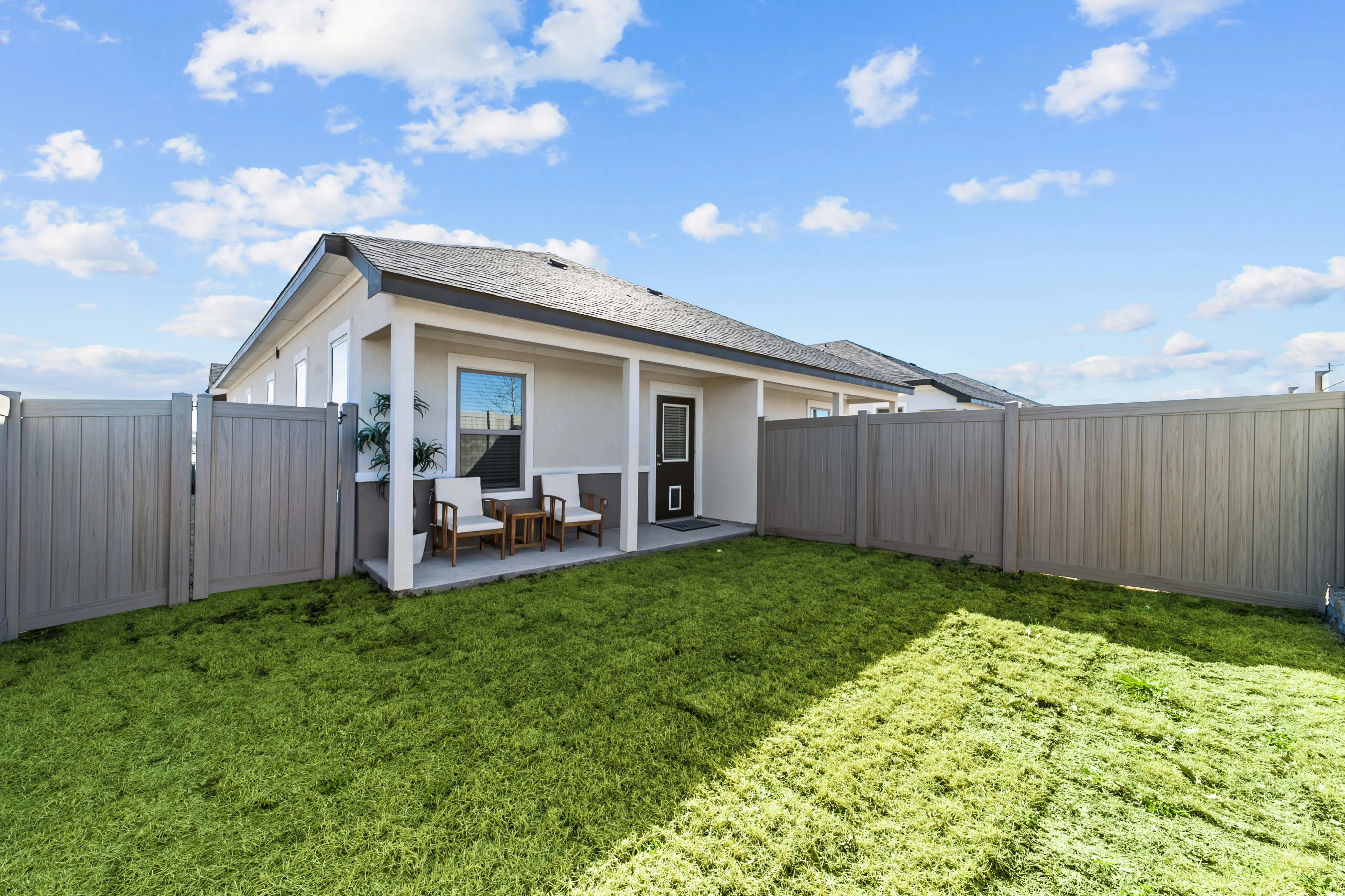 Private Fenced-In Yards & Covered Patios with Weekly Lawn Care