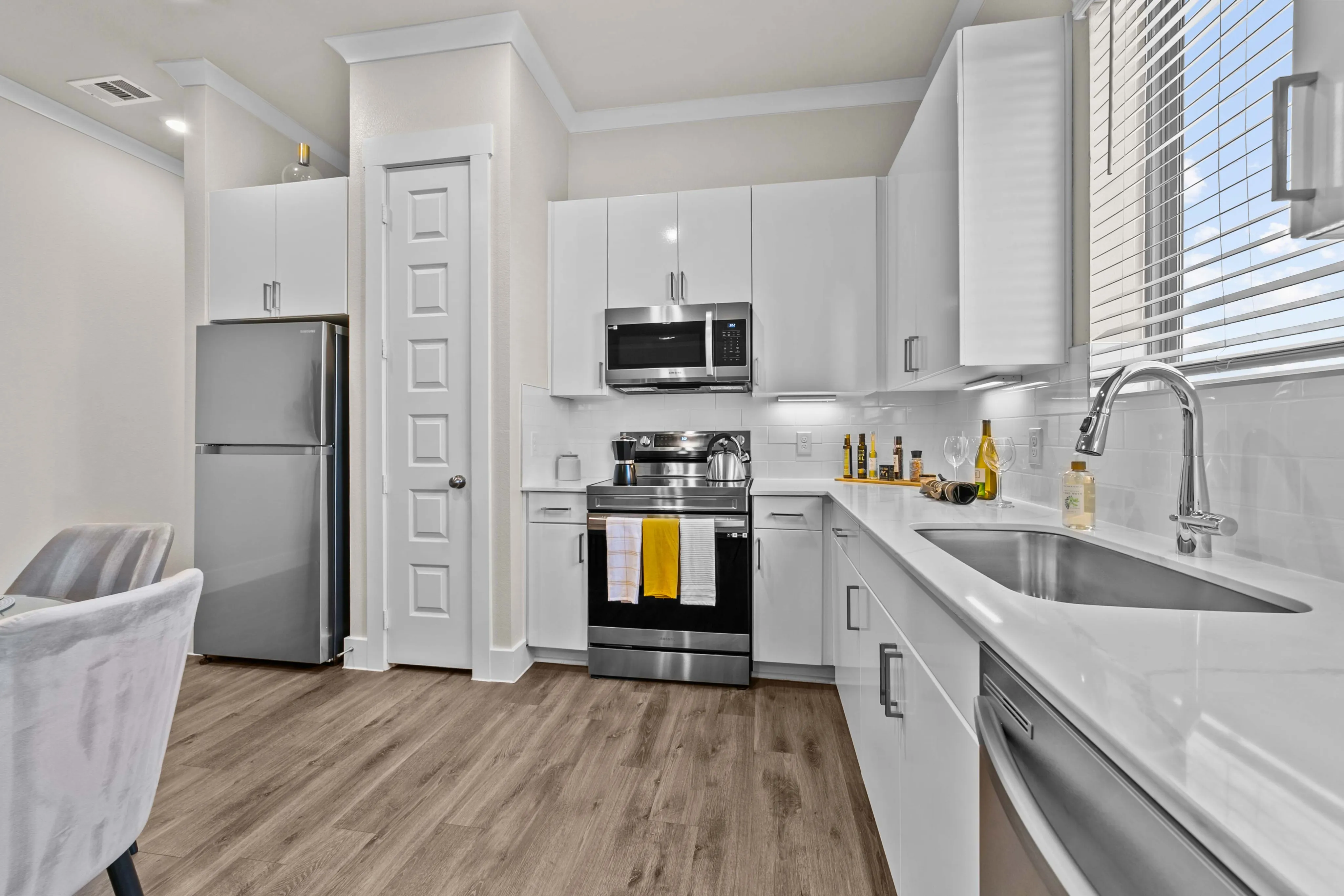 Designer Kitchen Cabinets with Matte Black Pulls