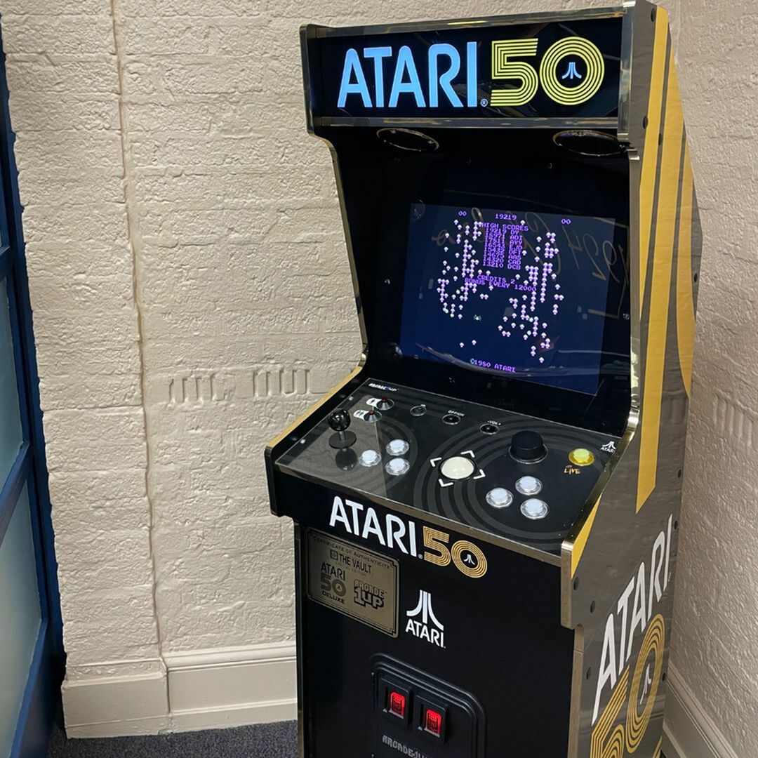 Vintage Atari arcade machine celebrating 50 years of iconic gaming.