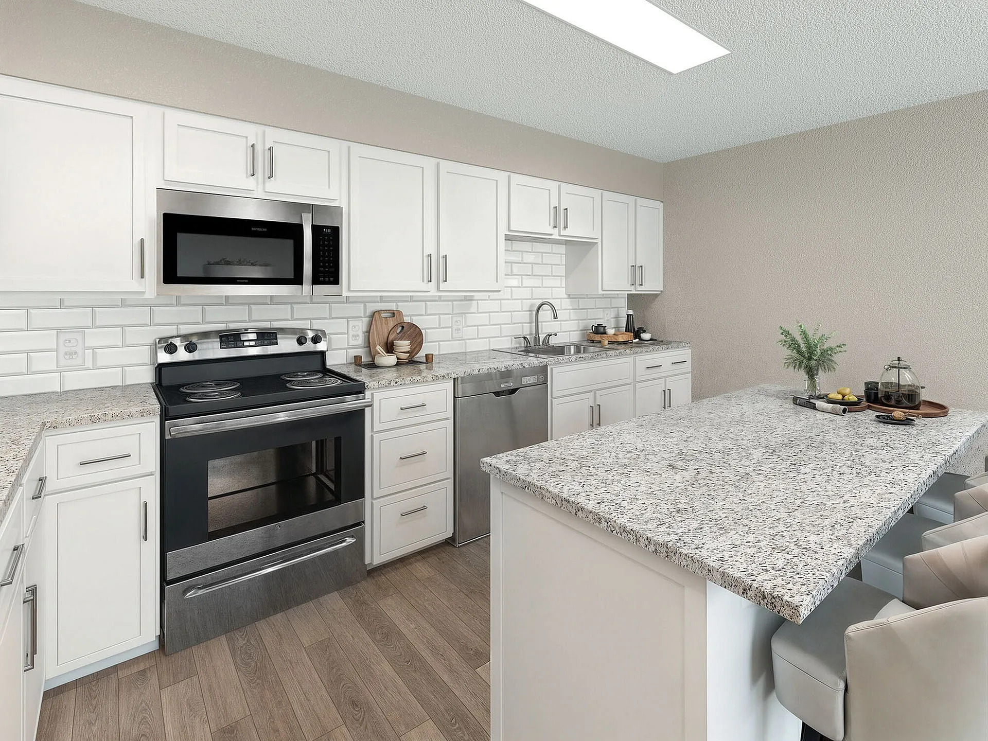 Modern kitchen with sleek white cabinets, granite countertops, and stainless steel appliances, offering a blend of elegance and functionality.