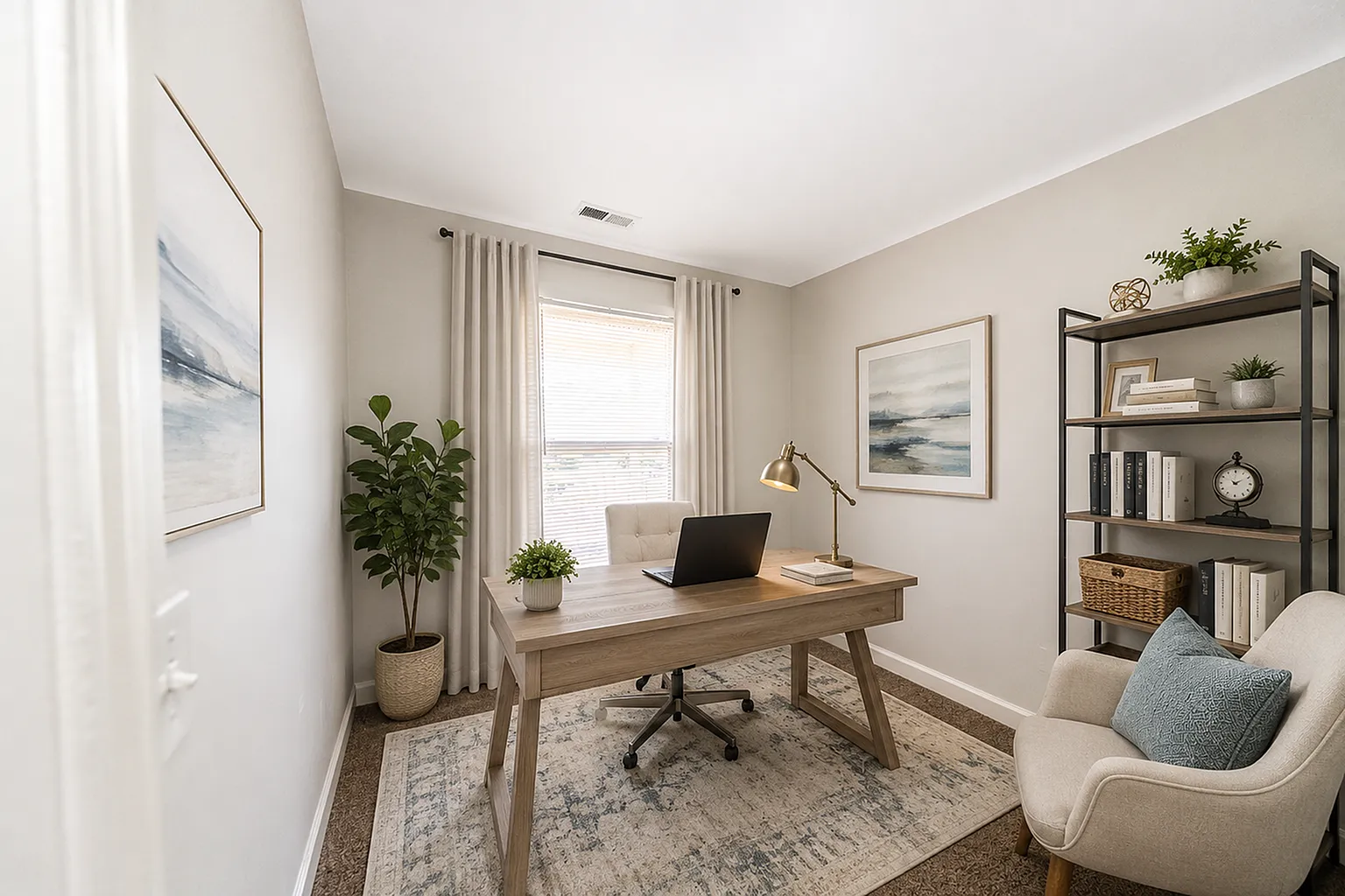 Chic home office with modern desk, elegant decor, and ample natural light.